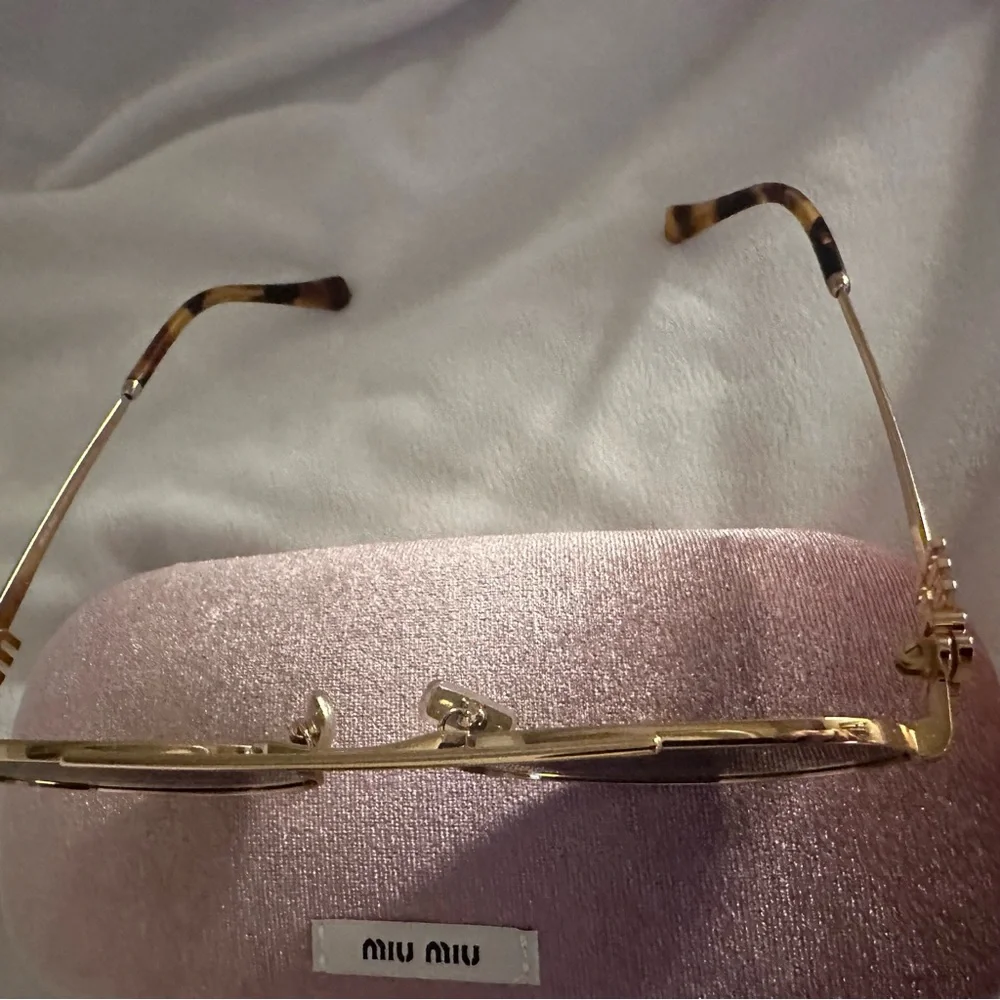 Miu Miu Oval Sunglasses - Picture 5 of 6